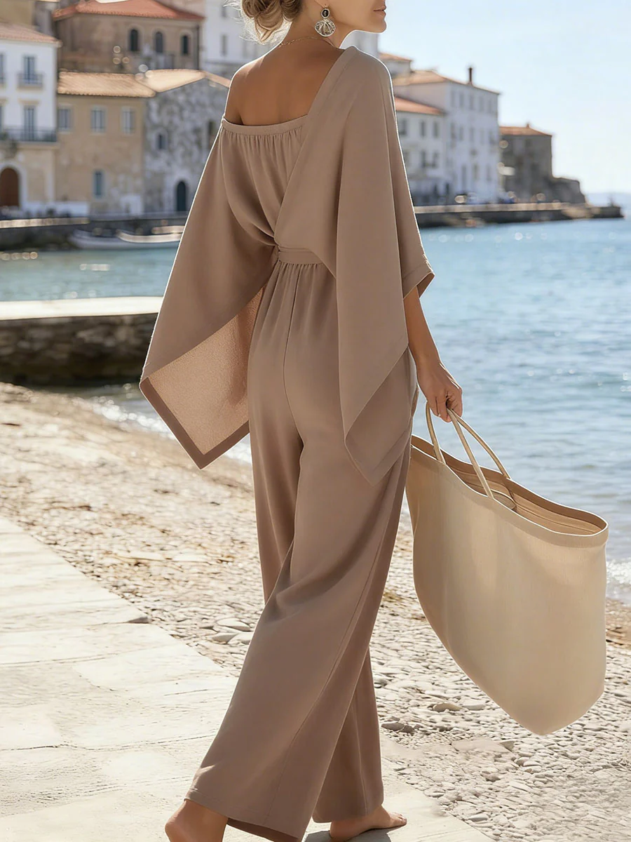 Batwing Sleeves High Waisted Buttoned Pleated Pockets Solid Color One-Shoulder Cape Jumpsuits - Image 5